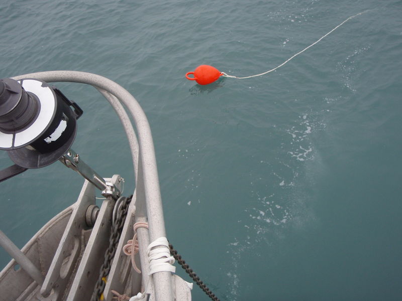 Title: A buoyed retrieval line can be used if retrieval is a serious concern. Foul ground where the anchor is likely to become stuck may necessitate this. - Description: C:\Users\Scott.Aitken\Desktop\BAA Blog Folder\Anchor Deployment and Setting - Retrieval-buoy-in-water.jpg